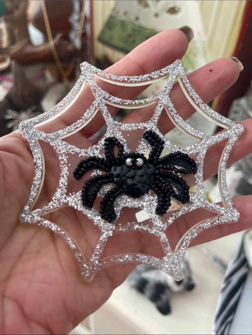Large plastic vintage glitter spider web brooch with beaded spider